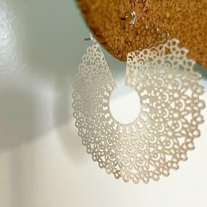 Silver colored earrings